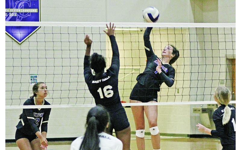 Addie Rucker gets up and finesses the ball past the Vikings during Wednesday’s volleyball game at the Longhouse. The Indians won all three sets in the best-of-five matchup, staying on pace for the best season in program history.