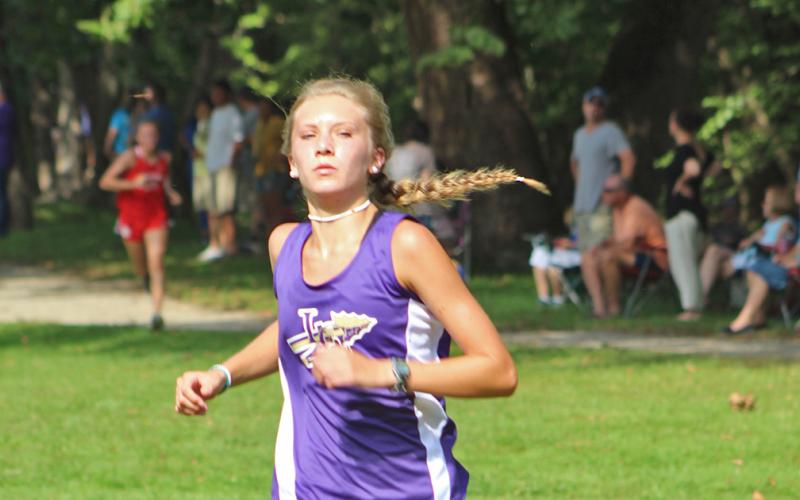 Runner Abbie Hilchie sprints the last leg of the course earlier this season. Hilchie has proven herself to be one of Lumpkin’s top runners again this season.
