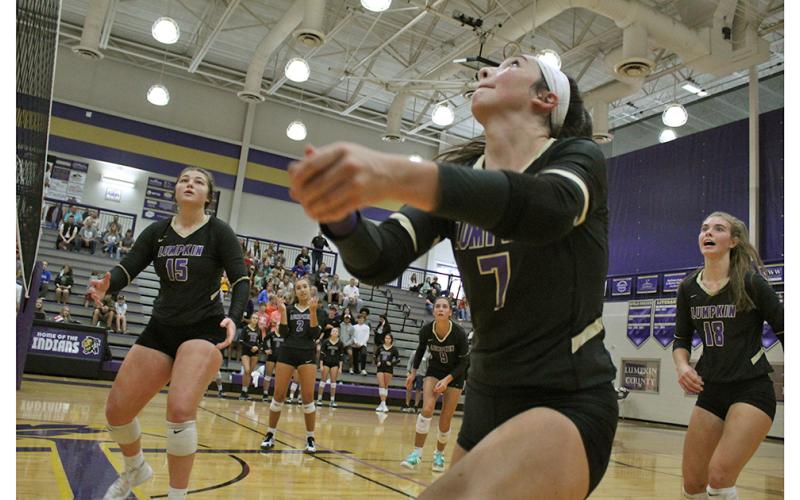 Addie Rucker focuses in to get a perfect set while teammates Reagan Spivey, Isabel Davenport, Kiersta Trammell and Victoria Crotzer look to react in time to get the ball back over the net during Lumpkin’s second round playoff match.