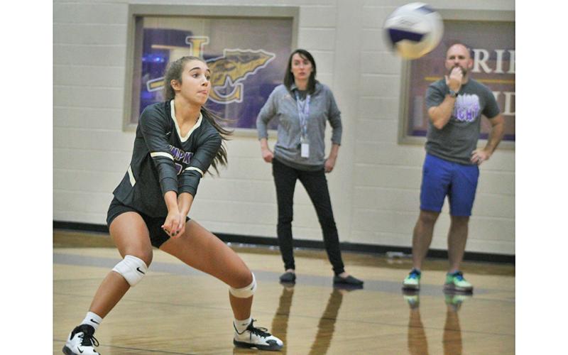 ABOVE: Senior Isabel Davenport’s defensive play has helped her squad all season. She leads the team with 123 digs.