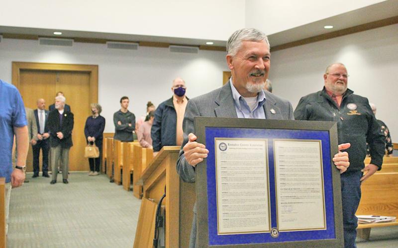 Lumpkin County Manager Stan Kelley was presented with a framed resolution, resolving to name what was once the old library building the Kelley Building, which will be home to the Development Services staff once completed. Kelley was honored in front of friends and family as well as former commissioners and other elected officials of Dahlonega and Lumpkin County, during the Nov. 17 Board of Commissioners meeting.