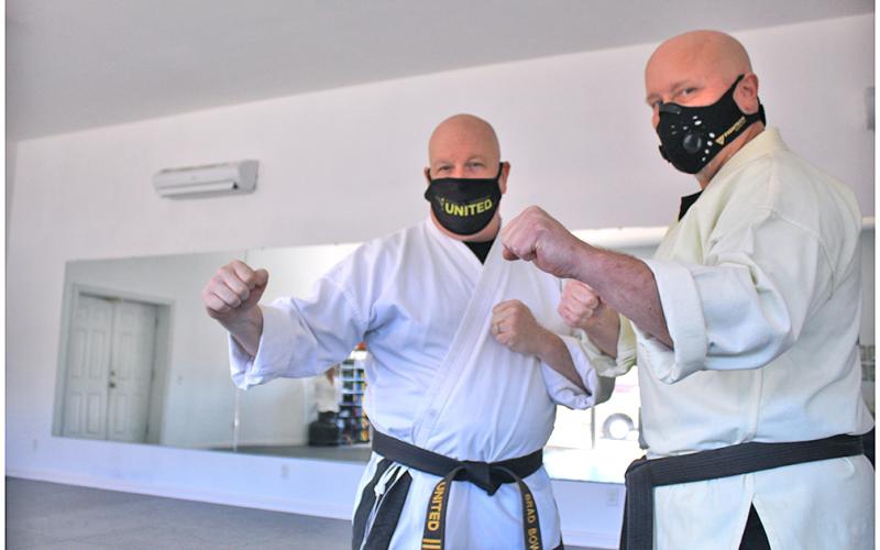 Instructors Brad Bowelle (left) and Wayne Marshall of Brad's United martial arts studio, have taught numerous students skills and techniques that transcend simply fighting another human. When facing hardship due to COVID-19, Bowelle was tasked with practicing the same resolve he preaches against the "unknown opponent" just to keep the doors of his studio open and in business.