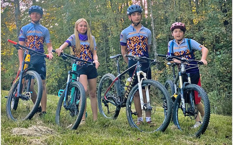 From left, Cru Norton, Shiloh Claussen, Connor Bagley and Devin White represented Gold City Composite on race days this fall in the new mountain bike team’s inaugural season racing in the Georgia Interscholastic Cycling League in 2020.