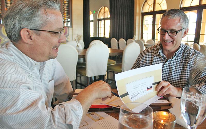 Chamber Board of Directors Chairman Matthew Garner (left) shares details of this year's plan with Executive Director Robb Nichols.