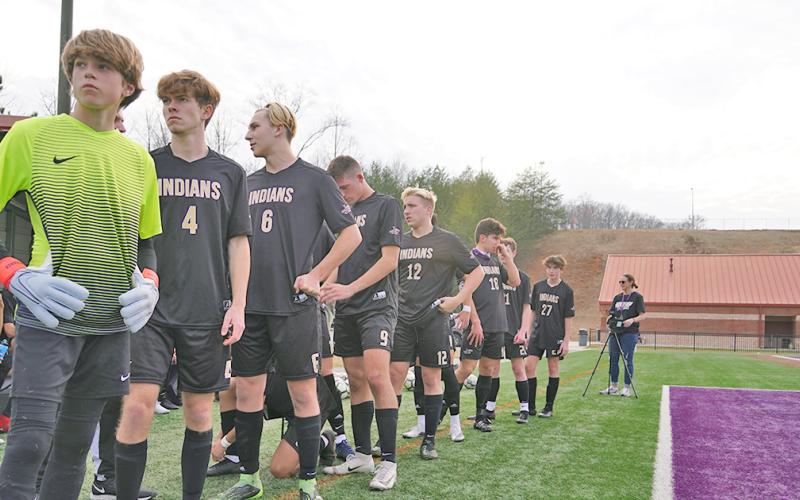 The Lumpkin County High School Varsity Boys Soccer team lines up to take the field against North Hall on Friday. Led by freshman Brauner Boegner (left) in goal, the Indians kept the clean sheet against the Trojans, holding on for a 1-0 win.