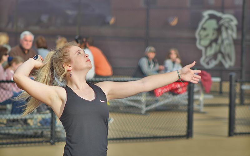 Bella Brock, who plays No. 1 Singles for the LCHS Girls Tennis team, prepares to serve during her match against North Hall.