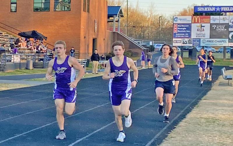 Pictured (from left) Ben Sherrill, Reece Butler and Will Edwards claim first, second and third place in the 1600 Meter Run for the LCHS Track team during its meet at West Hall earlier in the season.