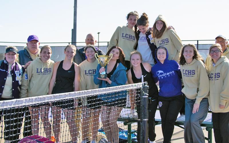 The LCHS Girls Tennis team celebrates its Region Tournament Championship after beating Cherokee Bluff in the finals of the tournament on Thursday, April 1. With the tournament win, the team is positioned for a state tournament run as a No. 1 seed. (photo by Esteban Ramirez)