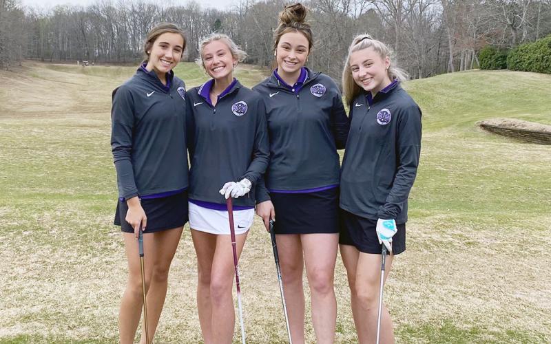 Isabel Davenport, Sarah Bell, Alyssa Chambers and Lexi Pierce of the LCHS Girls Golf take a quick pause during a recent match. As the team prepares for the Area Competition, all four look to compete for a spot on the Lumpkin scorecard.