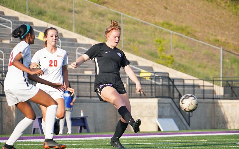 Lumpkin’s Rae Lynn Myers sends a pass across the field to a teammate during Lumpkin’s Sweet 16 matchup with GAC.