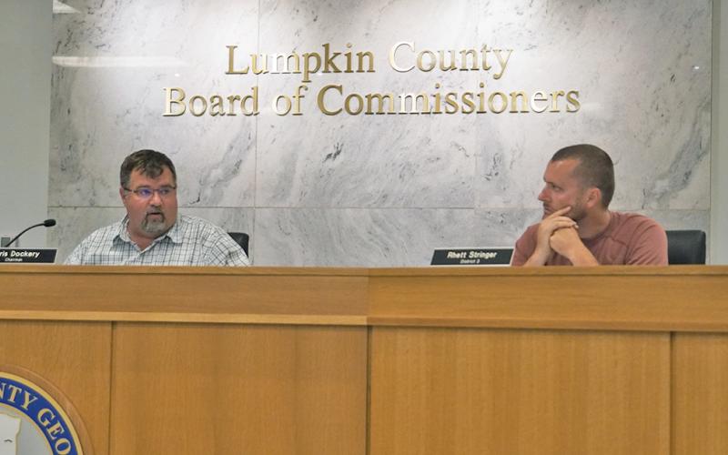 Lumpkin County Commissioners Chris Dockery and Rhett Stringer discuss the postponement of the May 6 Public Hearing and when the earliest make up meeting could occur, following a misadvertisment of the meeting.