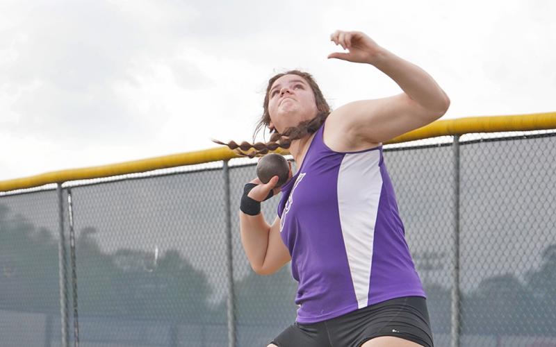 Grace Jones launches her shot put attempt during the Area Track Tournament at White County High School, claiming region champion in the event and qualifying for sectionals.