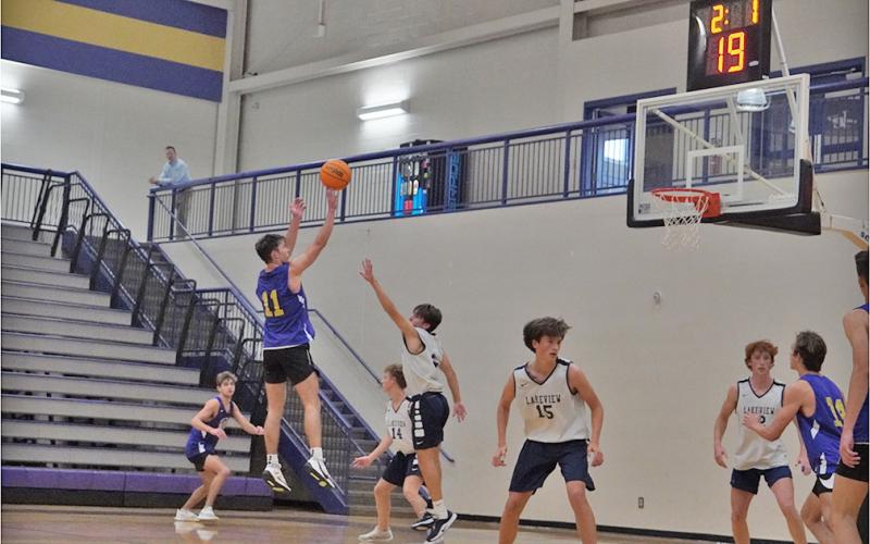 Rising Lumpkin senior Jones Harris takes a shot during the Indians’ recent Shot Clock League game versus Lakeview. Both LCHS basketball teams have competed in several games with the newly implemented shot clock rules in order to be ready for this season.