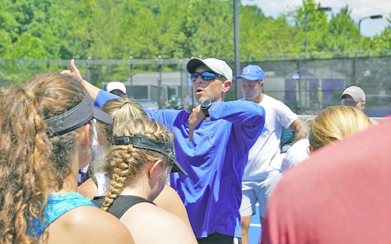 UNG Tennis head coach Kent Norsworthy instructs campers at the LCHS Tennis Camp.