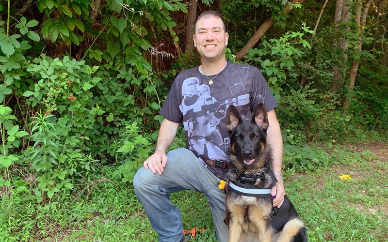 Dahlonega resident Brad Blazek, accompanied by his service dog Shadow, has bravely fought his own personal battle since suffering a brain injury while serving in Iraq. And he’s hoping to help others who have similar struggles, with his new children's book.