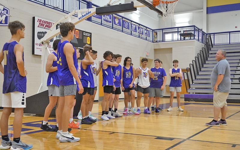 LCHS Boys Basketball Head Coach Michael Parker instructs his team during a recent summer practice. After putting in tons of hard work so far this summer, Parker is excited to keep improving as the offseason continues.