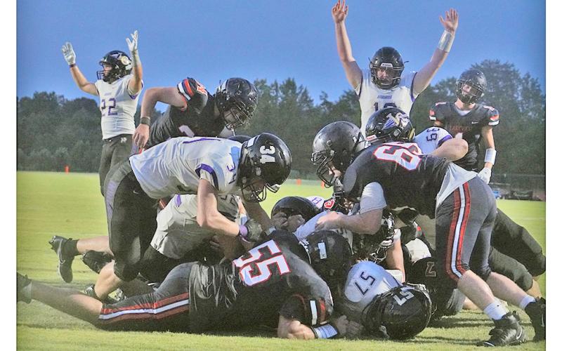LCHS senior lineman Ricky Hicks plows ahead for two yards and the touchdown on a crucial fourth down play during the Indians’ scrimmage against Lakeview Academy on Friday. Head Coach Caleb Sorrells said his team starts and ends with the play of his veteran line this season, as the entire starting line from last season returned to the team in 2021.