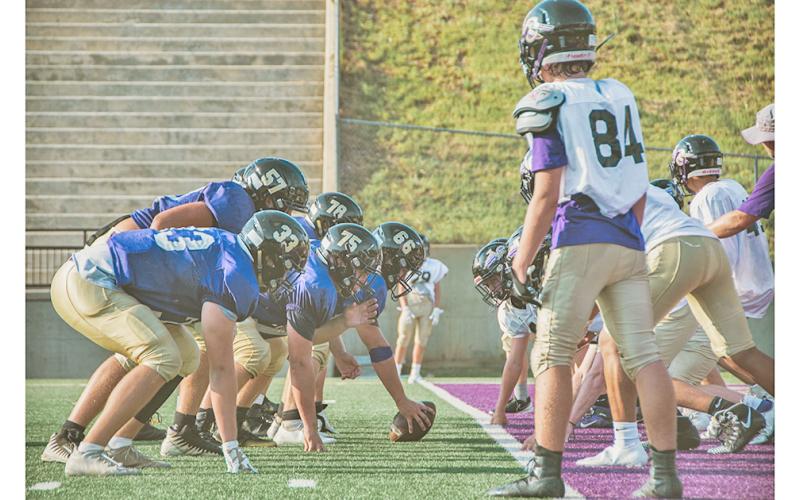 The football team practiced for an hour during Meet the Indians Night, giving the public a chance to see the team in action as the other teams gathered.