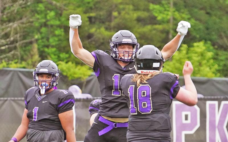 Caleb Norrell (center) and Cooper Scott (right) celebrate a touchdown during the spring scrimmage against Johnson High School. Indian’s fans can get a first glimpse at the team at Meet the Indians Night this Friday, in hopes of seeing the first of many celebrations that will happen this season.