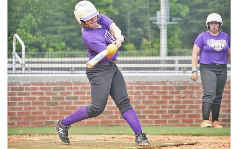 Senior Amma Johnson squares around on a base hit during a recent practice as the LCHS Softball team prepares for its season. Johnson will need to be a key contributor on offense as the team aims to “score in every inning” this season.