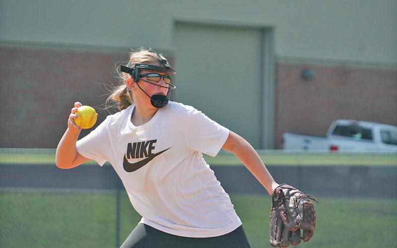 Riley Dyer fields a ball ready to fire to first base during a LCMS Softball team summer workout with the LCHS Softball Coaching staff. LCHS Softball head coach Joseph Jones and his staff have been investing time in the younger middle school team in hopes of helping them further develop for better success at both the middle school level now and the high school level in years to come.