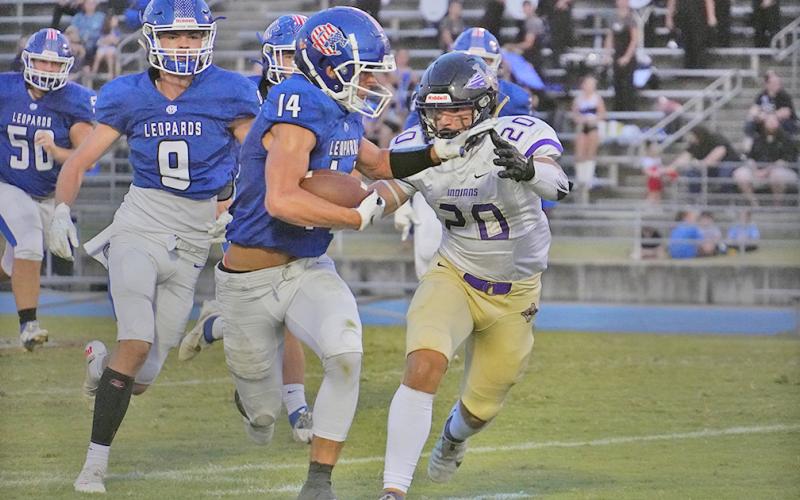 Senior Daniel Brinson goes for a tackle against the Banks County ball carrier during Friday night’s game against the Leopards. The Indians fell 26-16 on the night.