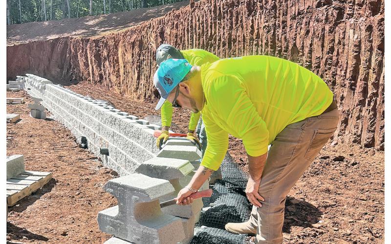 Joe Dickman gets to work on the future site of Community Helping Place’s new Anne Green Free Clinic.