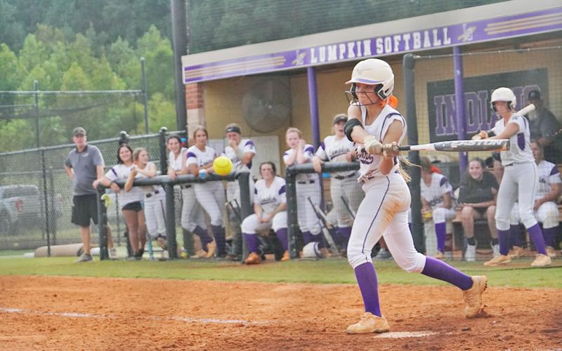 Haley Sparks steps to slap a pitch in a recent game. Sparks and teammate Brooke Temples led the way for the Indians against North Hall with two hits each as Lumpkin put up 10 runs in the defeat.