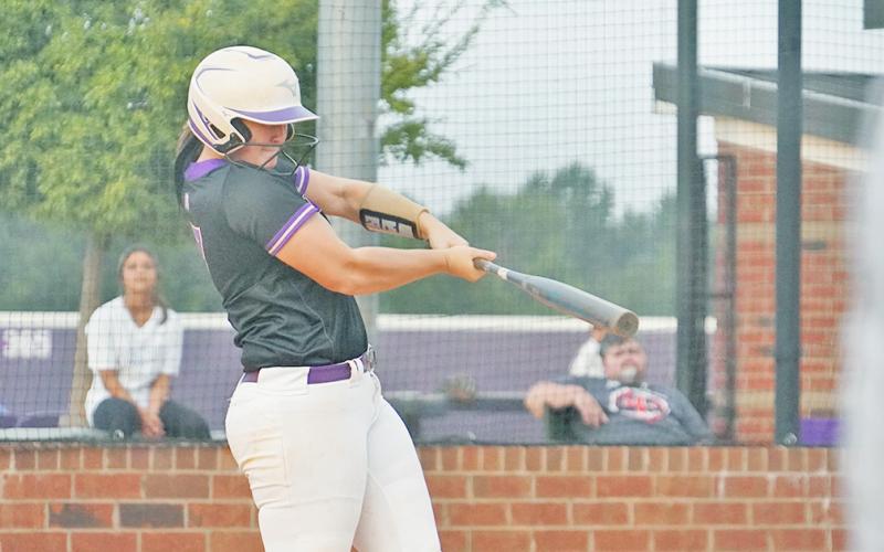 Natalie Shubert sends a first-inning pitch over the fence in left field to give the Indians an early lead over region foes Cherokee Bluff on Thursday.