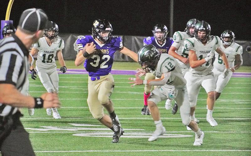 Lumpkin sophomore Mason Sullens avoids would-be tacklers with a huge run for Lumpkin’s longest play of the night before eventually punching the ball in for the Indians’ lone score against North Hall.