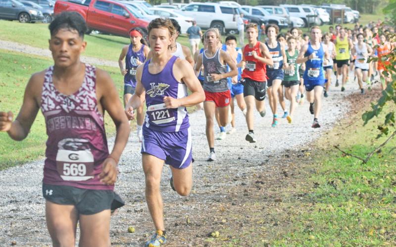 Lumpkin’s Wyatt Windham runs near the front of a pack of runners during the Mountain Invitational at Unicoi State Park last week. Windham went on to finish 15th overall with a time of 18:16, just behind teammate Ben Sherrill who finished 14th to lead the way for the Indians.