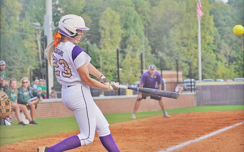 Kelsey Marshall slams a double into the gap in her Senior Night game on Friday against North Hall. Marshall then came around to score one batter later, representing Lumpkin’s lone run of the night, falling 4-1 to the Trojans.