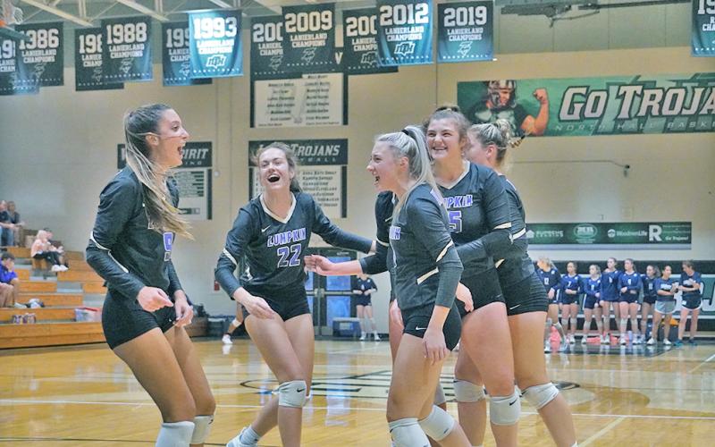 The Indians celebrate a point during their Region Tournament match against North Hall during Day 2 of the 7 AAA  Region Tournament on Thursday.