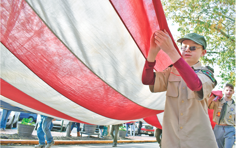 Pictured: Nolen Padgett (front) and Ethan Lawson were among many who participated in last weekend’s annual Veterans Day parade through downtown.