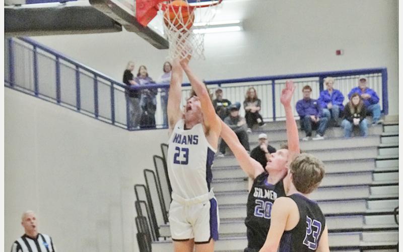 Preston Cox puts up a tough layup in the post versus Gilmer County on Tuesday, Dec. 14. Despite facing a talented and experienced team with tons of height and skill in the post, the Indians’ big man held his own, scoring 11 points and five rebounds in the game.