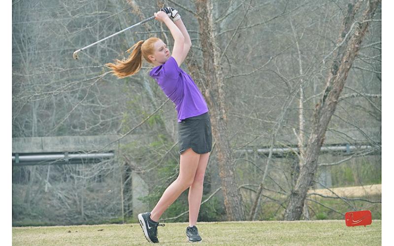 Sophomore Harper Hubbard sends a drive off the tee during Tuesday’s match versus Fannin County. Hubbard shot the low score of the round for Lumpkin on the girls side with a 51.