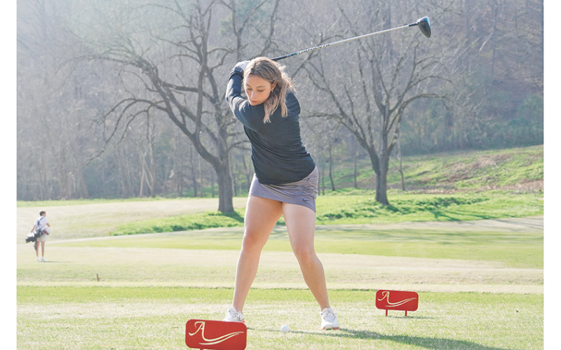 Lumpkin senior Alyssa Chambers sends a drive off the tee during a recent match at Achasta Golf Club in Dahlonega. The senior finished her Lumpkin golf career last week at the Area Tournament as her team finished seventh out of 16 teams.