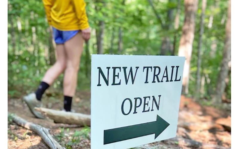 Officials from the Lumpkin County Development Authority, Lumpkin County government, and Yahoola Outdoors celebrated the grand opening of a newly opened portion of the reservoir trail. (Photo submitted)