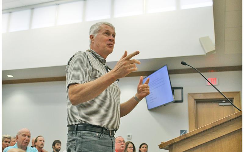 Tom Kuipers moved to Lumpkin County a few years ago in part because the Aquatic Center was in the works. Speaking at the county’s heavily attended work session on Tuesday, Kuipers was one of about 12 members of the public that came before the board to give their concerns with the newly proposed pool plan.