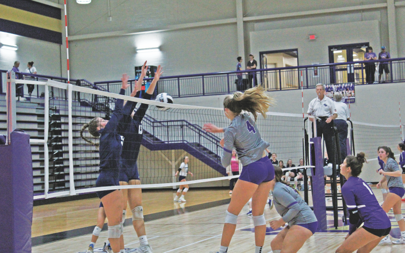 Outside hitter Morgan Powell spikes one home as Lumpkin battles White County last week. The Indians fell to White County, but defeated West Hall during Senior Night.