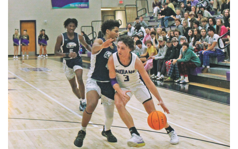 Lumpkin senior Hunter Cooper led the Indians with 13 points in the season opener.