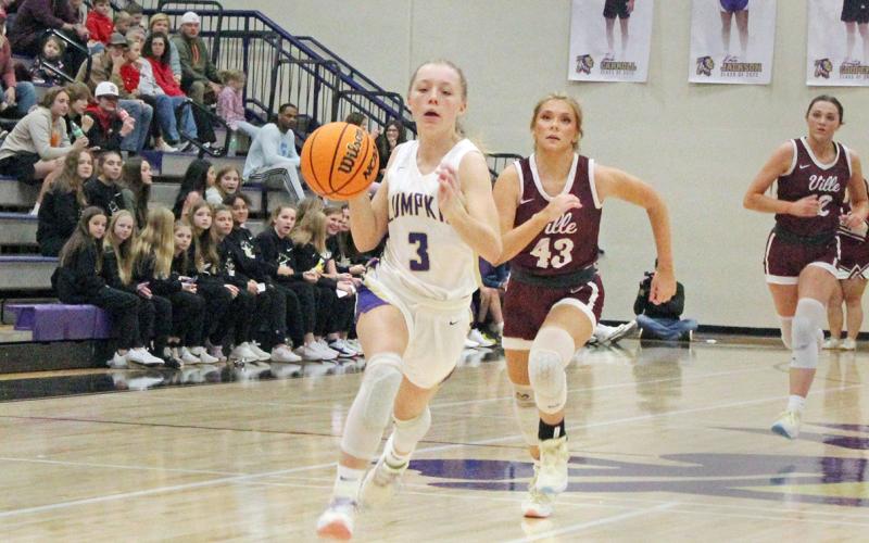 Ciera Brooks breaks away from her Dawson defender. The junior finished with nine points and four steals.