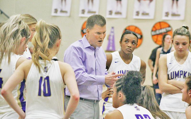 Lumpkin County girls basketball head coach David Dowse speaks to his team during a timeout in last week’s Senior Night game.  Lumpkin is competing in the Region Tournament this week.