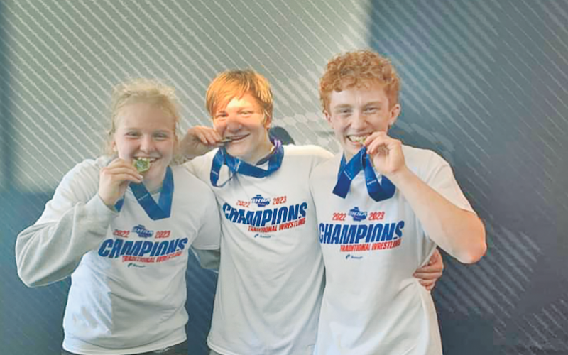 Lumpkin County High School had three wrestlers who became State Champions last week, including (from left) Greta Garbuzovas, Nathan Nielsen, and Austin Marshall.