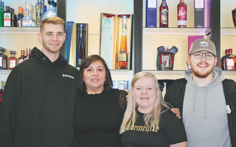 Employees of Gold Rush Spirits in downtown Dahlonega include (from left) Ryker Maxwell, Sonika Ahluwalia, Angelica Foster and Hunter Chandler.