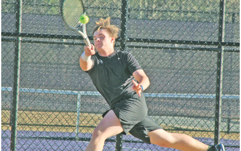 Lumpkin County junior Braden Garrett returns a shot against his Forsyth Central opponent last week.