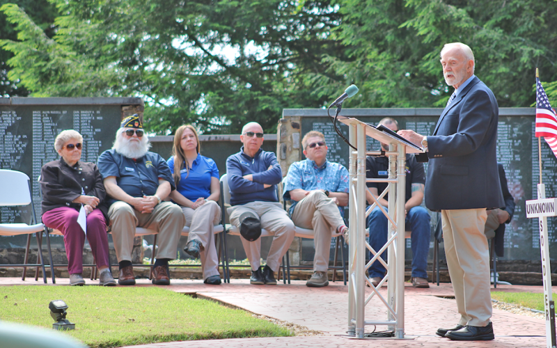 Vietnam veteran Paul Hanson addresses the crowd at Veterans Park during the annual Memorial Day ceremony on May 27. Hanson has played a leading role in the biannual effort to place Memorial Flag Markers along Dahlonega’s roadsides.