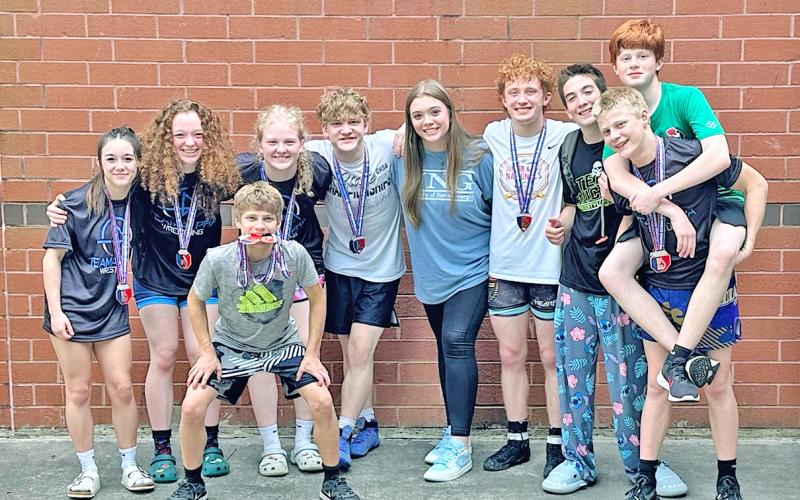 Lumpkin wrestlers gather together following their very successful meet.