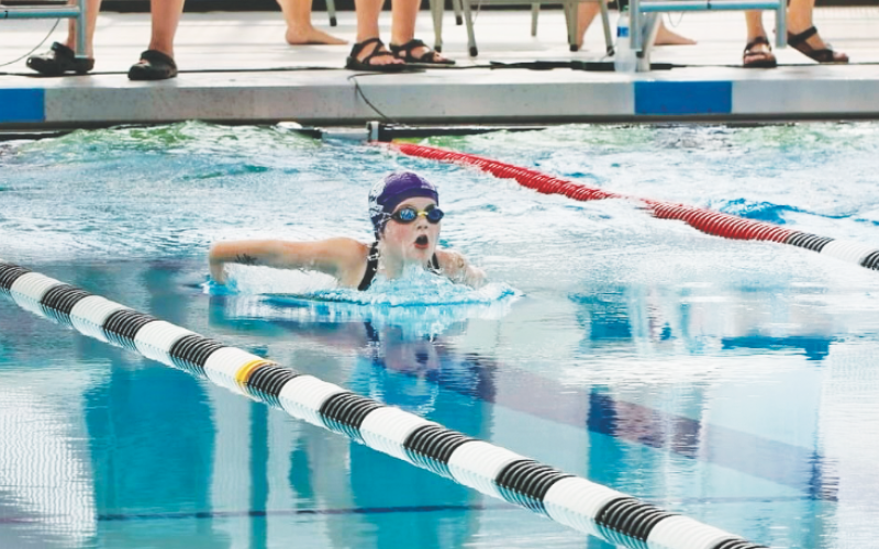 Lumpkin swimmer Emmeline Cox competes in one of her events at the state competition.