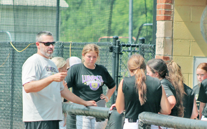 LCHS softball Head Coach Joseph Jones talks with his team following a very productive practice last week.